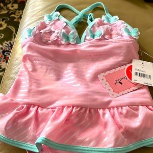 NWT! Girl’s Size 4 One piece bathing suit. Pink with butterflies and ruffles